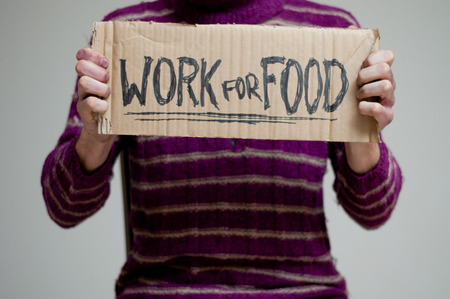 Woman holding a Cardboard written work for foodの写真素材