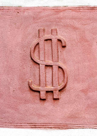 dollar symbol on old wallの写真素材