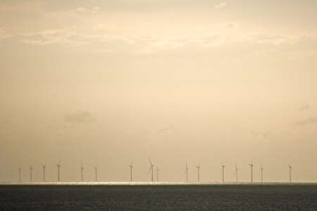 offshore windfarm at sunsetの写真素材