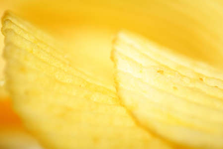 close up of crinkly cut potato chips