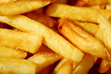 close up photograph of french frie or chips,