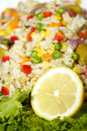 mixed vegetable rice salad with lemonの写真素材