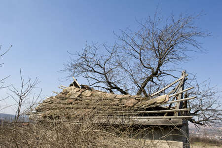 traditional Serbian mud house in field