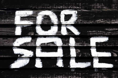 hand painted for sale sign on old wood planksの写真素材