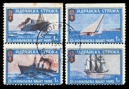 vintage stamp depicting ships from the former Yugoslavian Adriatic coastal Navy