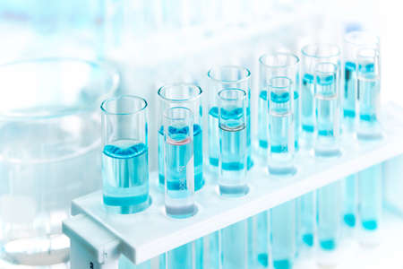 Laboratory tubes with blue liquid in the laboratory, available for scientists working in laboratories, tools for laboratory scientists.の写真素材
