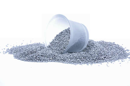 Candlestick on the silver granulesの写真素材