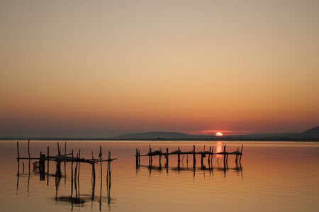 Sunrise on the lakeの写真素材