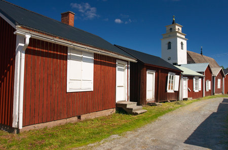 World Heritage Gammelstad. The church cottages in the church town with the Nederlule?hurch in the background.    のeditorial素材