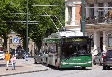 Landskrona, Sweden - May 31, 2013: A green trolleybus in traffic for Sk?trafiken on line 3.のeditorial素材