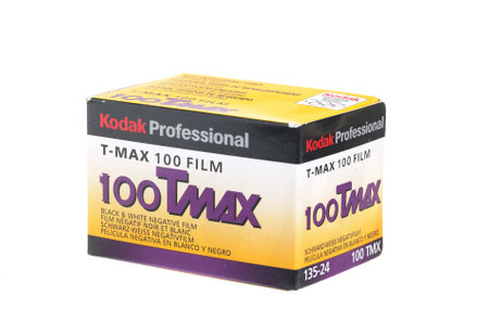A pack of about 2003 with black and white negative film, Kodak TMAX 100 for 24 exposures. Isolated on white background.のeditorial素材