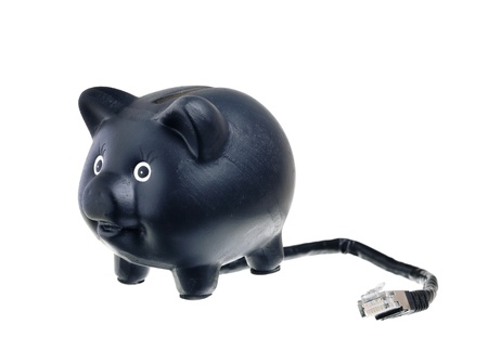 An Internet bank in the form of a piggy bank with a network cable on white background, showing the modern banking business with self-service.の写真素材