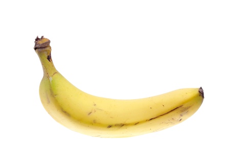 A yellow ripe banana isolated on white background の写真素材