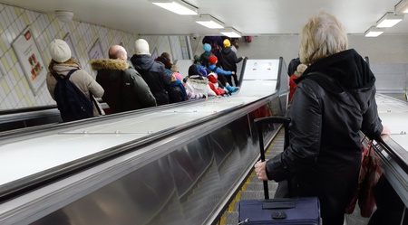 People in escalator at the subway station T-Centralen Stockholm Sweden の素材