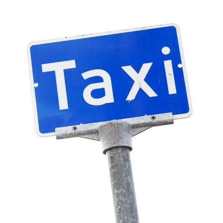 Blue Norwegian road sign for taxi stand isolated on white background.の写真素材