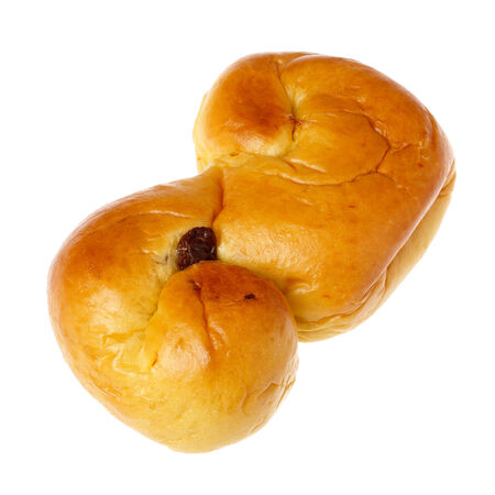 Typical Swedish saffron bun \"lussekatt\" eaten in conjunction with the Lucia celebrations and Christmas celebrations.の写真素材