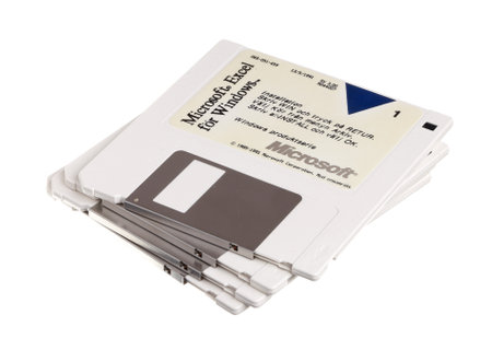 Stockholm, Sweden - September 3, 2014: Four istallations floppies for the Swedish version of Microsoft Excel 3.00 for Microsoft Windows. The discs are produced in 1991 isolated on white background.のeditorial素材