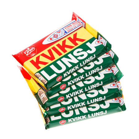 Trondheim, Norway - March 23, 2015: A stack of five Norwegian Kvikk Lunsj (Quick lunch) packages market by the Freja brand. It is confection and contains a bar of wafer covered with milk chocolate.のeditorial素材