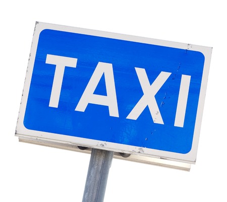 Sign at a a Swedish taxi stand isolated on white.の写真素材