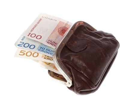 One brown purse filled with three Norwegian banknotes in the demonitations of 100の写真素材