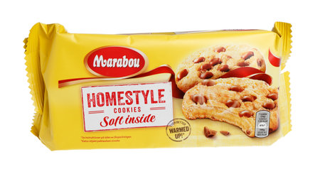 Stockholm, Sweden - August 1, 2015: One unopened yellow package of Marabou Homestyle chocolate chip cookies for the Swedish and Finnish market isolated on white packground.のeditorial素材