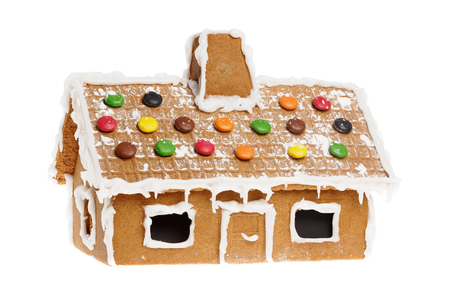 One gingerbread house isolated on whitebackground.の写真素材