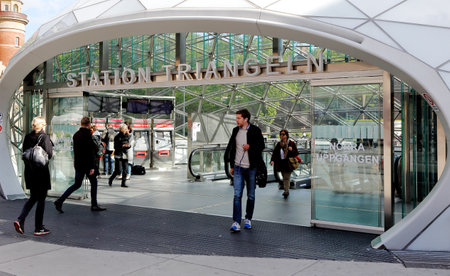 Malmo, Sweden - May 26, 2015:: People in motion at the entrance to the railway station Triangeln northern entrance.のeditorial素材