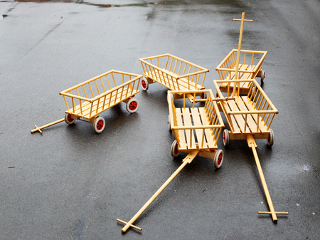 Five empty small wooden wagons.の写真素材