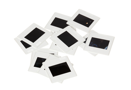 A group of white plastic framed  slides isolated on white background.の写真素材