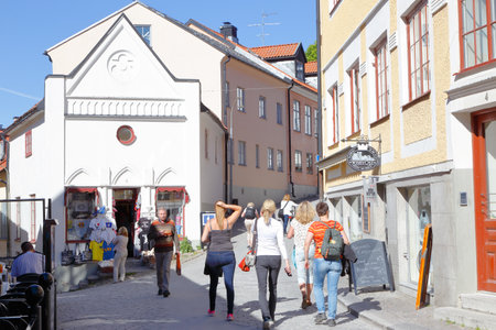 Visby, Sweden - May 12, 2016: The Wallers place location in downtown Visby  with peopele walking the narrow streets.のeditorial素材