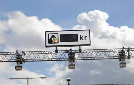 Road sign at the automatic pay station for Swedish toll.の写真素材