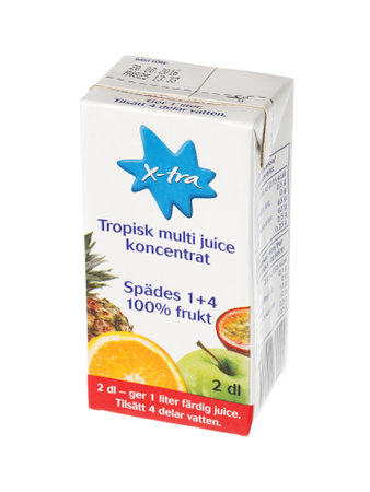 Stockholm, Sweden - May 6, 2016: An unopened pack of 2 ounces of concentrate for Coop X-tra tropical multi fruit juice for the Swedish market isolated on white background.のeditorial素材
