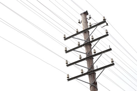 Close-up of a vintage telegraph line and telephone pole with a blank line.