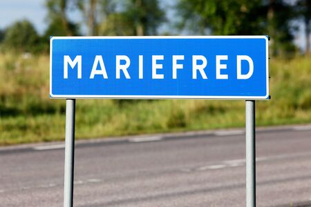 Road sign with te name of the Swedish town Mariefred.の写真素材