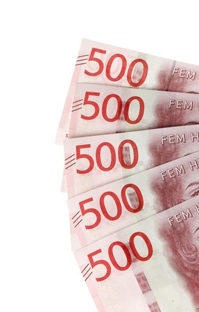 Left most part of five Swedish five hundred krona banknotes isolated on white background.の写真素材