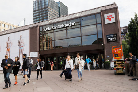 Oslo, Norway - September 16, 2016: People outside the main entrance too the Oslo central railway station.のeditorial素材