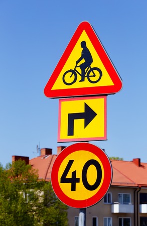 Swedish road signs for bicycle crossing warning sign and speed limit 40.の写真素材
