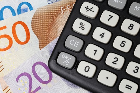 Close up of a calculator on Swedish money.の写真素材