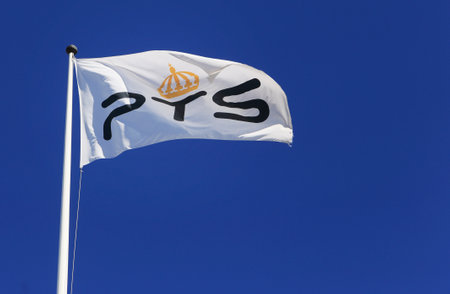 Stockholm, Sweden - August 2, 2013: The Swedish Post and Telecom Authority (PTS ) flag at the office...