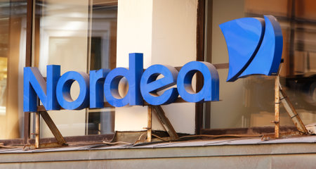 Stockholm, Sweden - August 2, 2013: Closeup of the Nordea bank office sign above the entrance at the office in downtown Stockholm.のeditorial素材