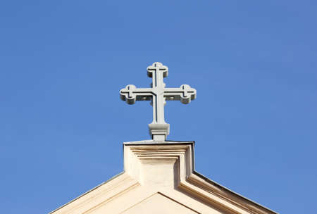 Christian cross on a church roof.の写真素材