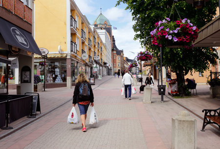 Harnosand, Sweden - July 5, 2017: Street view of the main shopping street Storgatan in Harnosand city center.のeditorial素材