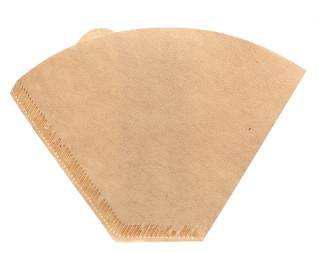 One new unused coffee filter flat isolated on white background.の写真素材