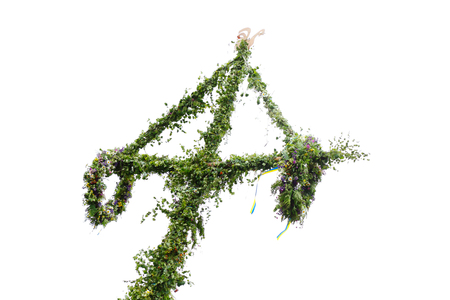 Top of a common green traditional Swedish maypole, used for the midsummer eve celebrations.の写真素材
