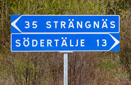 Swedish signpost for the two cities Strangnas and Sodertalje.の写真素材