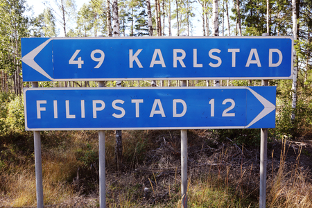 Signpost to the two Swedish cities Karlstad and Filipstad.の写真素材