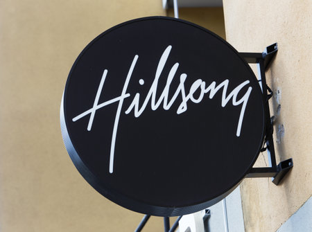 Sodertalje, Sweden - July 20, 2017: The Hillsong church sign at the entrance to the church located at the Oxbacksgatan street.のeditorial素材