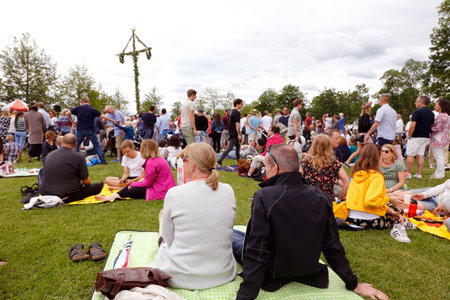Mariefred, Sweden - June 23, 2017: People in all ages celebrates in public midsummer eve holliday event.のeditorial素材