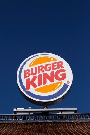 Kristinehamn, Sweden - June 8, 2018: Close-up of the roof top sign at the Burger king hamburger restaurant.のeditorial素材
