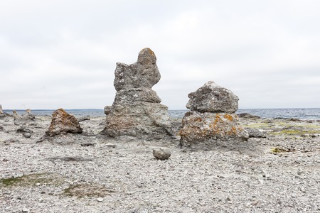 Sea stacks at Folhammar near Ljugarn in the Swedish province of Gotland.の写真素材